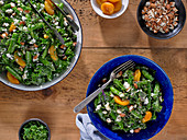 Kale and Sugar Snap Pea Salad with Dried Apricots and Crumbled Feta Cheese
