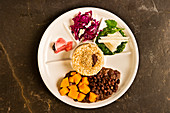 Vegetable plate with azuki beans, pumpkin and cereals