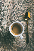 Coffee cup on rustic wooden table