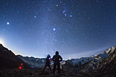 Geminid meteor shower over mountains in China