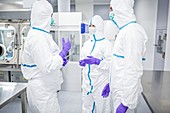 Lab technicians in sterile environment