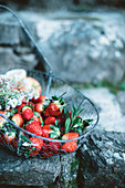 Basket with strawberries and apples