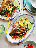 Fish fillets with grilled corn salad