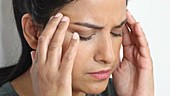 Woman with tension headache