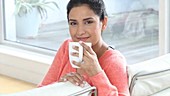 Woman drinking coffee