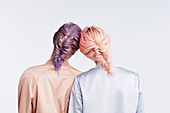 Two women with pink and purple hair