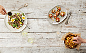 Buckwheat noodle salad with avocado and egg, canapes and crisps