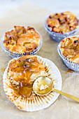 Baked apple muffins with caramel sauce