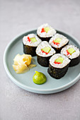 Vegan maki sushi with honeydew melon and pink ginger