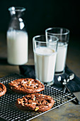 Chocolate cookies and glasses of milk