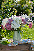 Bouquet of flowers of the shrub hydrangea 'Pink Annabelle' and 'Annabelle'