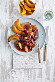Moroccan tagine stew with beef, beetroot and orange