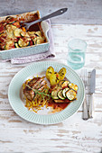 Pork fillet with rosemary potatoes and an aubergine and pumpkin medley