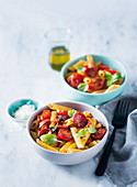 Penne with tomatoes and chorizo