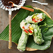 Vegetarian spring rolls on a banana leaf