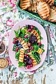 Roasted beetroot, raspberry, grilled cheese salad with poppy seed and balsamic