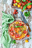 Pie with cheese and tomatoes