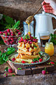 Waffles with honey and berries