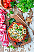 Spinach rotolo baked in tomato sause