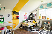 Colourful accents on walls in child's bedroom