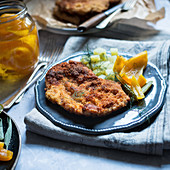 Pork schnitzel with pickled peppers and dill steamed potatoes