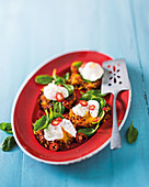 Curried vegetable röstis with poached eggs