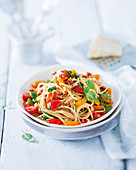 Spaghetti with chorizo crumbs and fresh tomato