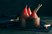 Poached pears in red wine with cinnamon and spices