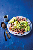 Beef and crunchy cashew salad with lettuce