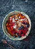 Millet with fruits, coconut and maple syroup