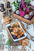 Roasted beetroot with chicken legs
