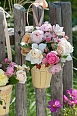 Bouquets Of Roses On The Garden Fence As A Welcome