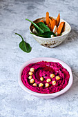 Hummus with beetroot and fresh vegetables