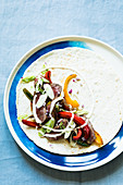 Mexican fajitas with beef and peppers
