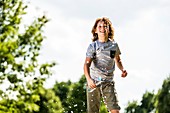 Boy splashing water