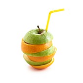 Sliced apple and orange with drinking straw