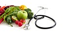 Fresh fruit and vegetables with stethoscope