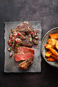 Sous vide chuck steaks with chimichurri and potato wedges