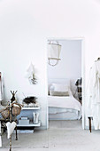 Living room and bedroom in white with vintage decoration