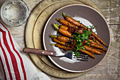 Carrot salad with dried tomatoes and parsley