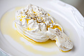 Burrata drizzled with olive oil and seasoned
