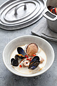 Seafood chowder with giant clams, mussels, prawns and chilli