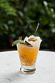 Passion fruit cocktail with fresh mint