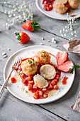 Potato dumplings with strawberry compote