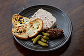 Terrine served with chutney, gherkins and toast