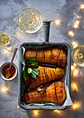 Hasselback butternuts with bay leaves, cinnamon and sage