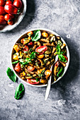 Summer pasta with roasted zucchini, tomatoes, peppers, and mushrooms
