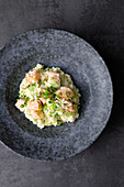 Leek risotto with limes, salmon and chilli