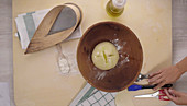 A woman making a yeast bread fir tree