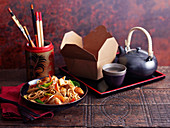 Chicken chow mein and tea (China)